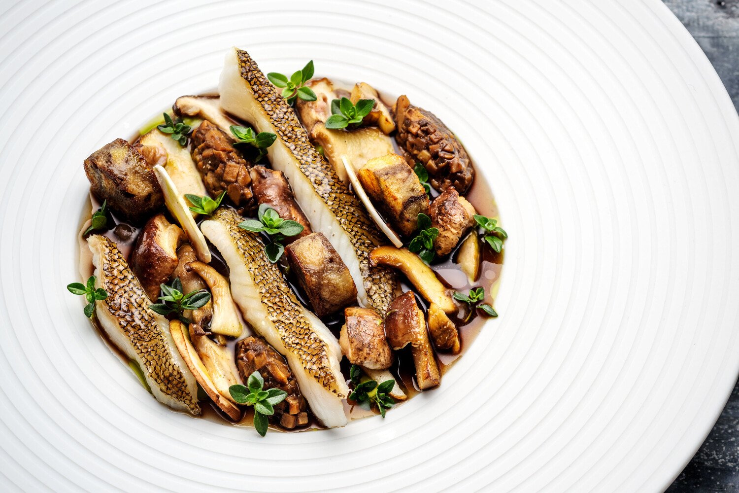Gourmet fish and mushroom dish at holiday destination Söl’ring Hof.