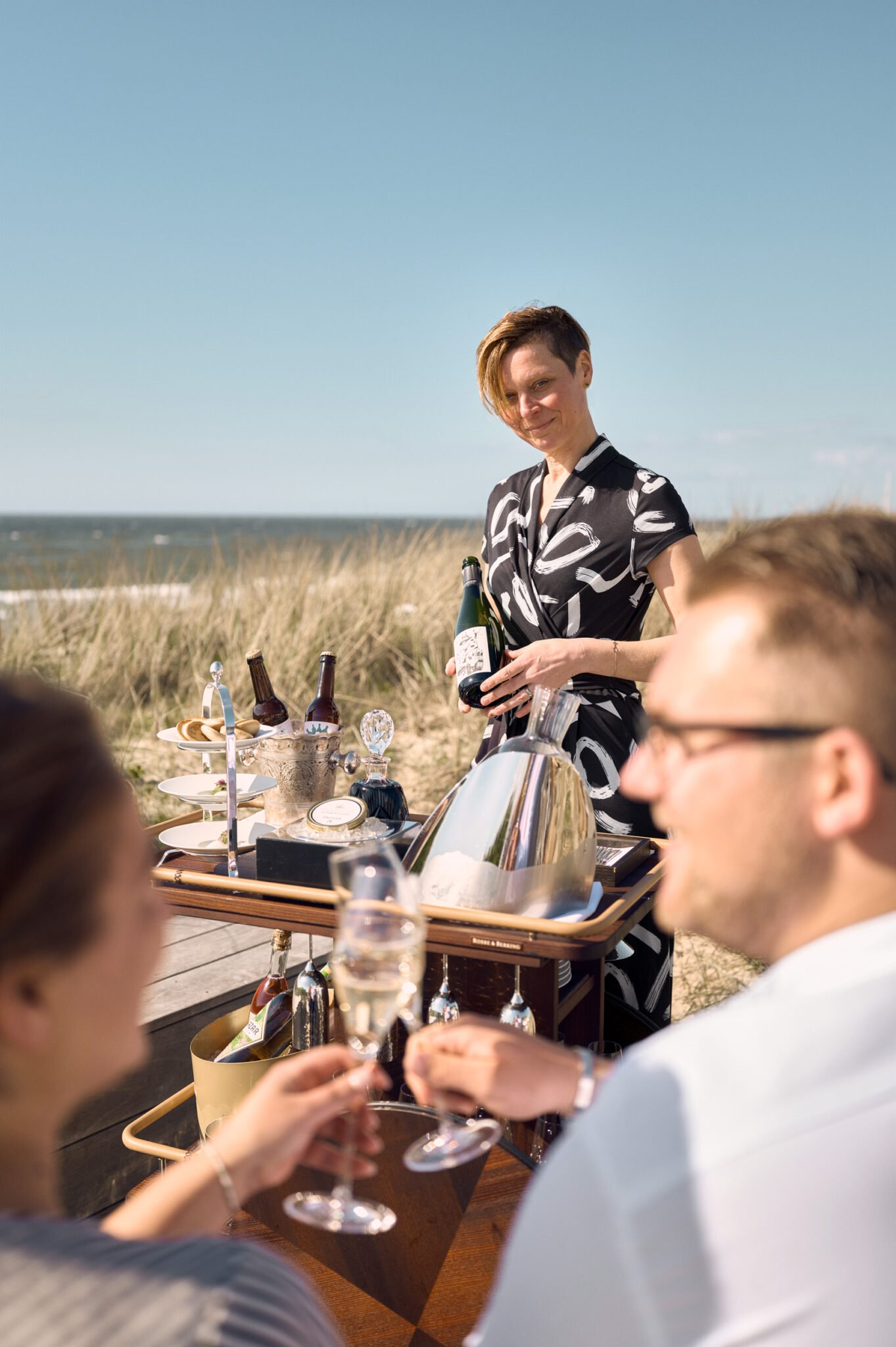 Champagner-Toast im Söl’ring Hof, dem Strandparadies auf Sylt.