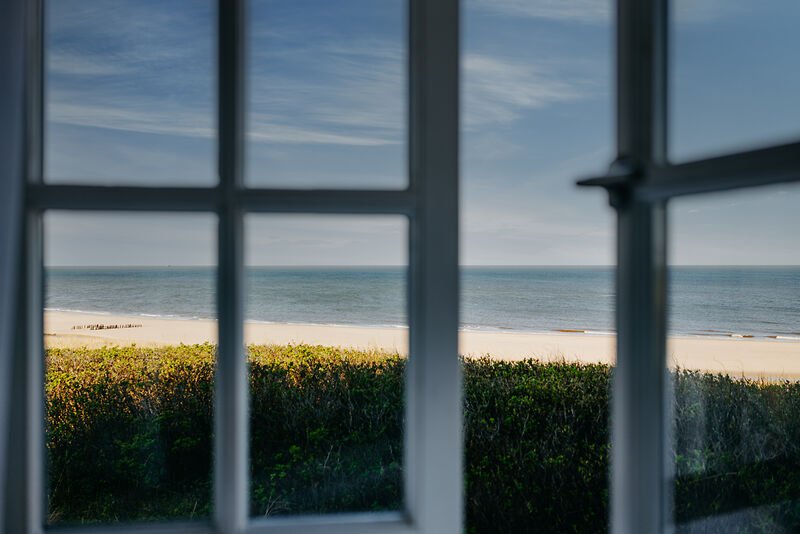 Blick auf den Strand von Sylt vom Söl’ring Hof aus – der perfekte Urlaubsort.