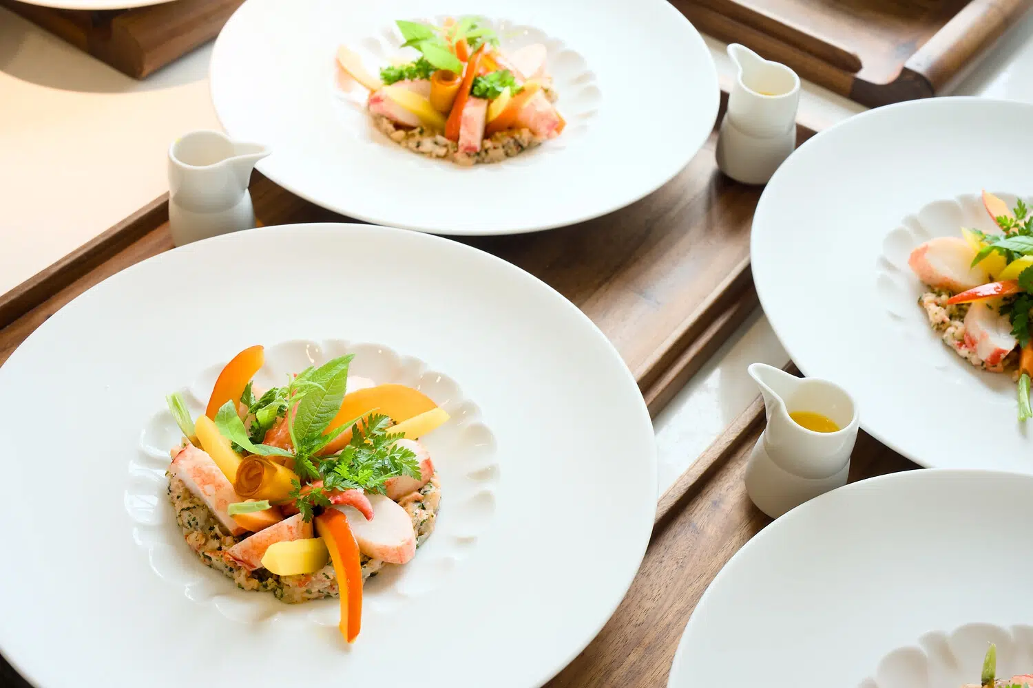 Meeresfrüchte-Gourmetgerichte im Söl’ring Hof, einem Urlaubsziel auf Sylt.